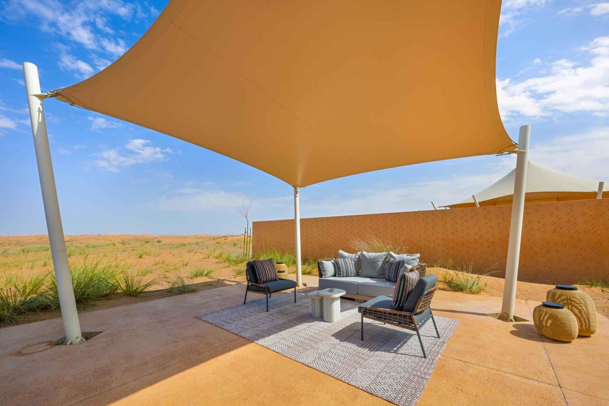 מלון Margham Al Badayer Retreat By Sharjah Collection מראה חיצוני תמונה A shade sail at the Al Maha Desert Resort, Dubai