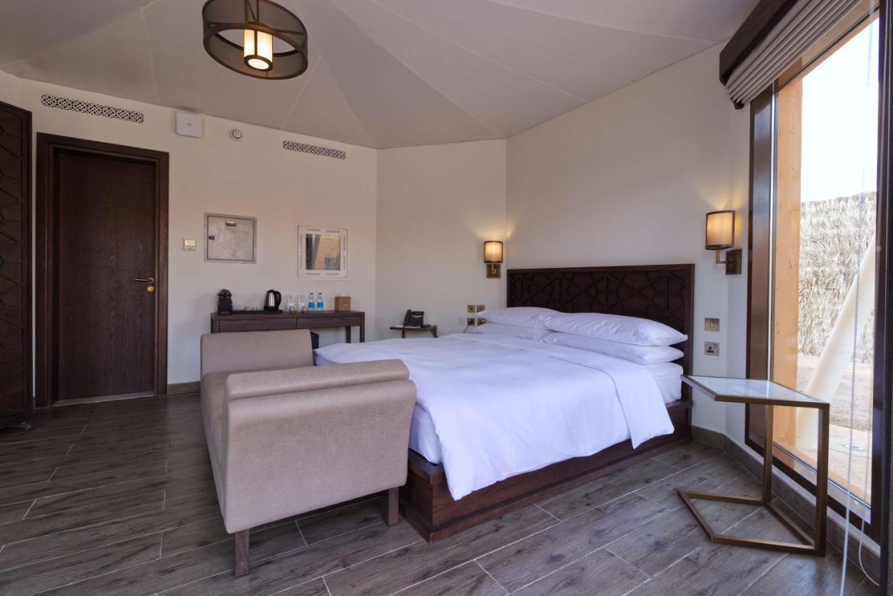 מלון Margham Al Badayer Retreat By Sharjah Collection מראה חיצוני תמונה A bedroom at the Al Maha Desert Resort